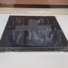 Clear glass display with black base and reflections.