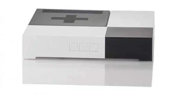 Konsola do gier wideo NES na białym tle.