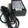 Black laptop power adapter with cord.