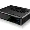 Black digital satellite receiver with clock display.