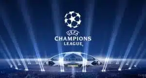 UEFA Champions League logo with stadium and spotlights.