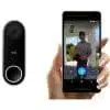 Person answering door through smartphone app.